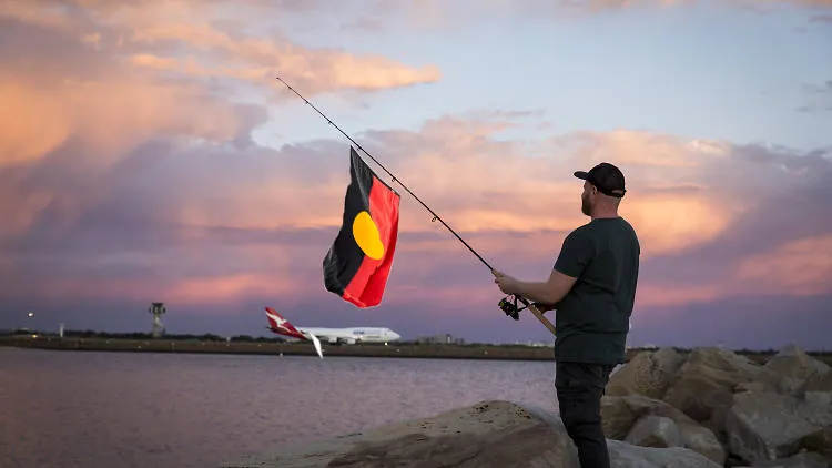 Fishermen return to Melbourne piers in #BLM garb